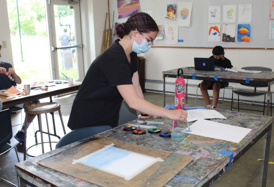Female Student making art