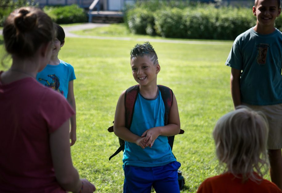 A boy wearing a backpack